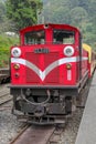 Alishan,taiwan-October 15,2018:The old red Train in Alishan Line (downhill) come back to Chiyi train station