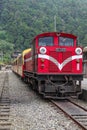 Alishan,taiwan-October 15,2018:The old red Train in Alishan Line come back to Chiyi train station at foggy day