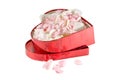 Alive pink and white petals in heart box