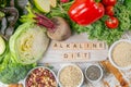 Alkaline diet concept - fresh foods on rustic background Royalty Free Stock Photo