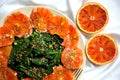 Alkaline, healthy food : kale and red blood orange salad Royalty Free Stock Photo