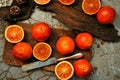 Alkaline, healthy food : red blood orange salad on a wooden board