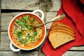 Alkaline, healthy meal: soybeans sprout soup and bread Royalty Free Stock Photo