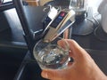 Alkaline water ionizer in a glass