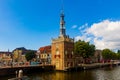 Alkmaar, Netherlands - August 08, 2022: Historic Excise Tower (Accijnstoren van Alkmaar) of 1622 and some houses