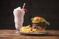 All-American Cheeseburger and Strawberry Shake Royalty Free Stock Photo