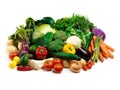 All the colors of the garden. Studio shot of a pile of fruit and vegetables against a white background.