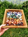 All Colour Colors CHAKRA purple THIRD EYE CHAKRA Gemstone Polished Hand Palmstones Rocks in wooden Box Near Water Spiritual