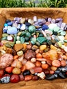 All Colour Colors Gemstone Polished Hand Palmstones Rocks in wooden Box Near Water Spiritual