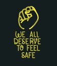 We all deserve to feel safe text with fist vector design