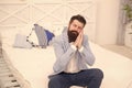 All dressed up and nowhere to go. Sleepy hipster sit on bed. Bearded with sleepy look in formalwear. Daydream. Feeling Royalty Free Stock Photo