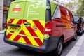 An All Electric Royal Mail Delivery Van Parked At The Side Of The Road In Central London