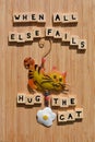 When All Else Fails Hug The Cat, words on wood Royalty Free Stock Photo