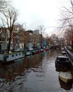 Boats on the Amstel river in Amsterdam