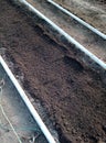 Miling ground sreeding soil in green house Royalty Free Stock Photo