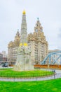 All heroes of the marine engine room memorial in front of the Royal Liver building Liverpool, England