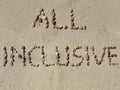All inclusive text on the beach sand Royalty Free Stock Photo