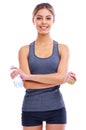 All the ingredients for a good workout. Portrait of a sporty young woman holding a bottle of water against a white Royalty Free Stock Photo