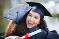 All those late nights paid off. Portrait of a young woman hugging her friend on graduation day. Royalty Free Stock Photo