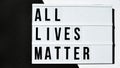 ALL LIVES MATTER text on a black and white background. Freedom of Speech Vintage Retro quote board. Protest against the end of