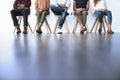 All they need is an opportunity. Shot of a group of diverse people waiting in line to be interviewed. Royalty Free Stock Photo