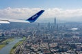 All Nippon Airways ( ANA ) Airplane wing with Taipei city skyline, Taiwan Royalty Free Stock Photo