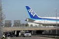 All Nippon Airways ANA plane taxiing over the bridge
