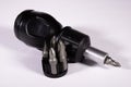 All-in-one screwdriver or screwdriver with different types of tips for screwing or unscrewing a variety of screws Royalty Free Stock Photo