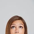 All the possibilities. Closeup shot of an attractive young woman looking up.