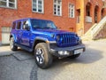 Big blue new Jeep Cheerokee four doors parked Royalty Free Stock Photo