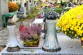 Flowers and candles on the grave at cemetery. All the Saints Day Royalty Free Stock Photo