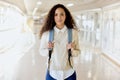 All set for the semester. Cropped portrait of an attractive young female college student standing with her backing in a Royalty Free Stock Photo