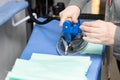 All sewn items and protective masks are pressed before being delivered to the customer Royalty Free Stock Photo