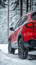 All terrain performance, red suv in winter landscape Royalty Free Stock Photo