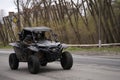 All-terrain vehicle for the evacuation of the wounded from the battlefield. Large wheels for transporting the military Royalty Free Stock Photo