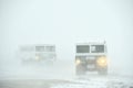 The all-terrain vehicle for snow trips to a snow blizzard in the tundra. Special car for the Arctic safari. Royalty Free Stock Photo