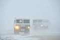 The all-terrain vehicle for snow trips to a snow blizzard in the tundra. Special car for the Arctic safari. Royalty Free Stock Photo