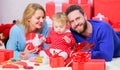 All thoughts about love. Love and trust in family. Bearded man and woman with little girl. Valentines day. Boxing day Royalty Free Stock Photo