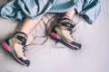 All time ready for trekking. Hiker female sleeping in comfort trekking boots. Footwear on the bed sheet background concept image. Royalty Free Stock Photo