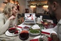 All together at the Christmas table during a video call Royalty Free Stock Photo