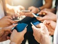 All together and connected. unrecognizable people using smartphones outside. Royalty Free Stock Photo