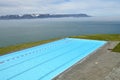 A haeted swimming  pool situated directly on the coast of Icland Royalty Free Stock Photo