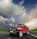 All-wheel drive car at the deserted highway Royalty Free Stock Photo