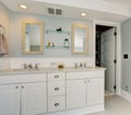 All white luxury master bathroom with vintage theme. Royalty Free Stock Photo