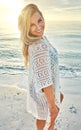 All you need is a dose of summer. a beautiful woman spending time at the beach on a sunny day. Royalty Free Stock Photo