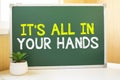 It is all in your hands in chalk on the school board, Search engine optimization and websites. Desk, swept balls of paper, Royalty Free Stock Photo