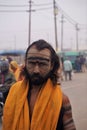 Allahabad, India, December 12,2019 Close up shot of a sadhu, face smeared up with sandal and coal