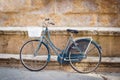 Alleging bike against a wall monument Royalty Free Stock Photo