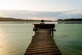 Fishing pier on the lake. office chair on a wooden pier.