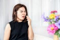 allergic Asian woman suffer from pollen allergy symptoms and sneezing Royalty Free Stock Photo